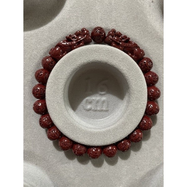 cinnabar with double piyao