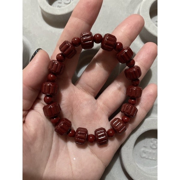 cinnabar bracelet round barrel